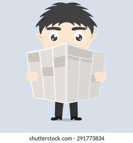 businessman reading a newspaper