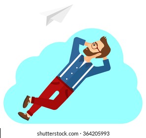 Businessman relaxing on cloud.