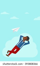 Businessman relaxing on cloud.