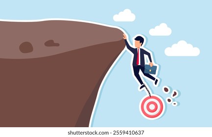 A businessman is at risk of falling while holding onto a target board at the edge of a cliff, illustration of facing failure in meeting company business targets