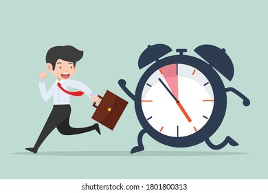 businessman Running with big ringing timer clock