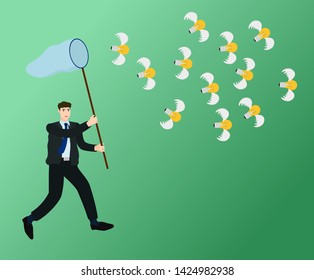 Businessman running and trying to catch flying idea with butterfly net