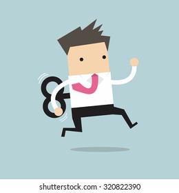 Businessman running with wind-up key