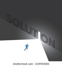 A Businessman runs to the white exit with light from the dark, Text wording SOLUTION on the big black wall with an opening. Business concept of ambition, challenge, achievement, motivation, chance.