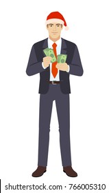 Businessman in Santa hat counts the money. Full length portrait of businessman in a flat style. Vector illustration.