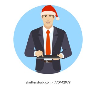 Businessman in Santa hat using digital tablet PC. Portrait of businessman character in a flat style. Vector illustration.