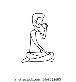 businessman seated in lotus position drinking coffee