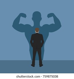 Businessman a shadow of an athlete - commitment and career strength concept