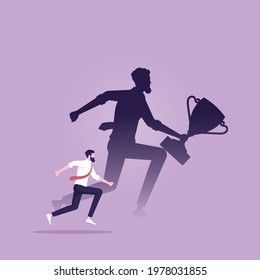 Businessman with shadow holding winner trophy cup on wall, Goal Achievement and success
