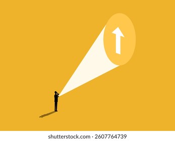 Businessman shines a flashlight and finds hidden growth directions