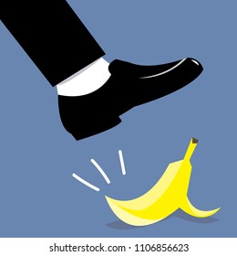 businessman shoe step on banana peel.concept of falling