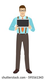 Businessman showing blank digital tablet PC. A man wearing a tie and suspenders. Full length portrait of businessman in a flat style. Vector illustration.