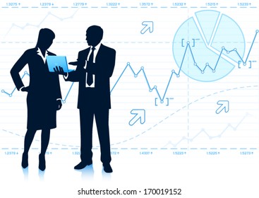Businessman shows laptop to businesswoman