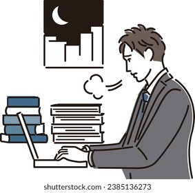 Businessman sighing after working overtime