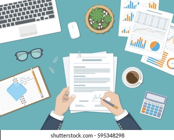 Businessman signing a document. Man hands with pen and contract. The process of business financial agreement. Document with a signature. Desk with forms, charts, laptop, calculator, glasses and coffee