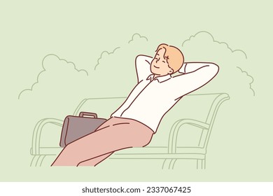 Businessman sits on park bench with eyes closed and enjoys outdoor recreation. Businessman or company manager with happy face relaxing on street during lunch break or after end of working day