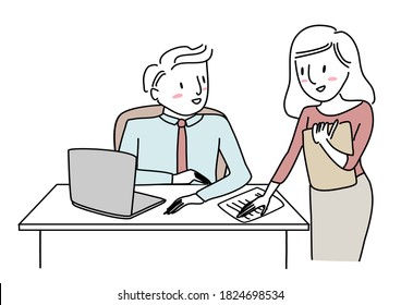 Businessman sitting at desk and talking with female coworker standing nearby. Cute young businesswoman putting paper on male colleague's desk. Female assistant placing paper sheet on boss's desk.