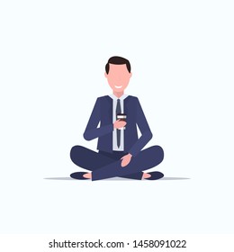 businessman sitting lotus pose young business man drinking coffee relaxation concept flat full length