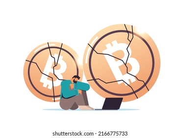 businessman sitting near crashed coin cryptocurrency crash bitcoin price collapse crypto loss investment