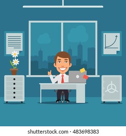 Businessman Sitting in Office and Showing Thumbs Up