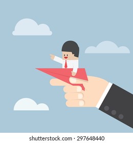 Businessman sitting on paper plane with big hand ready to throw, VECTOR, EPS10
