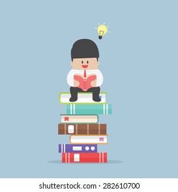 Businessman sitting on the stack of book and read it, VECTOR, EPS10