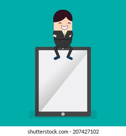 Businessman sitting on tablet