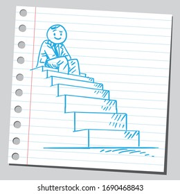 Businessman sitting on top of stairs.