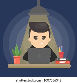Businessman sitting tired late at the office. Deadline.