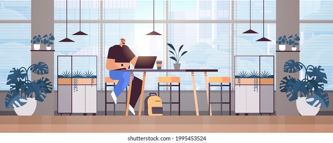 businessman sitting at workplace casual business man freelancer working in creative office