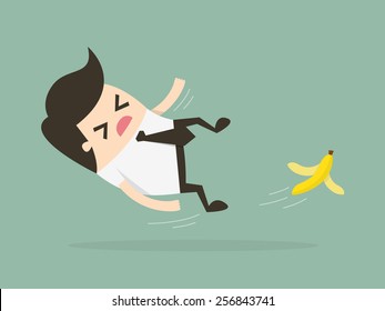 Businessman slipping on a banana peel. Business concept illustration.