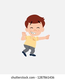 Businessman in smart casual style pointing to something funny on his left.