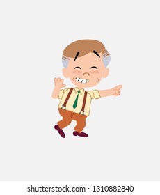 Businessman in smart casual style pointing to something funny on his left.