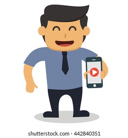 A businessman is smiling while show a good video on his smartphone
