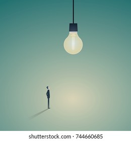 Businessman stadnding below big lightbulb. Business creativity vector concept. Eps10 vector illustration.