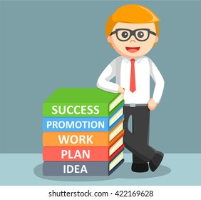businessman standing beside stack of book