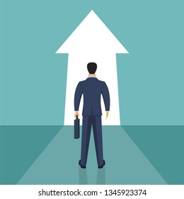 Businessman standing in front of an arrow vector design illustration