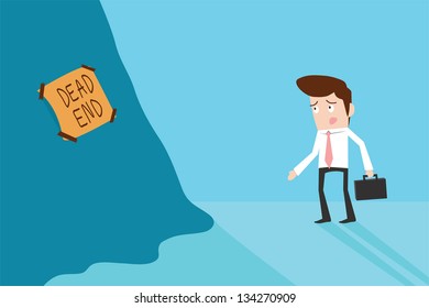 Businessman standing in front of dead end