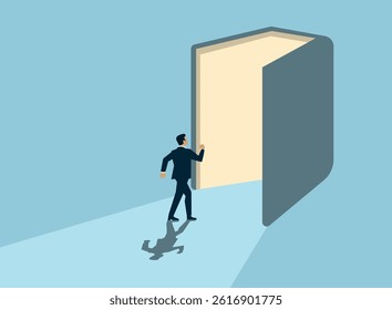 businessman standing in front of a large open book.