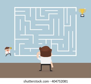 Businessman standing in front of a maze with a solution to success