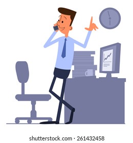 Businessman standing near the workplace and talking on the phone