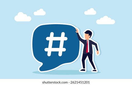 Businessman standing next to a chat dialog with a hashtag, illustration of the importance of SEO keywords for increasing sales or attracting digital public attention