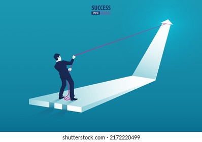 Businessman standing on arrow graph and pulling it upwards with rope. grow chart up increase profit sales and investment