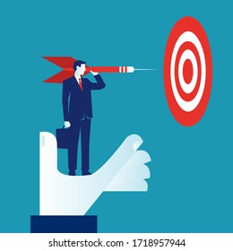 Businessman standing on a big hand holding an arrow about to throw it to the goal isolated on blue background. New business goal challenge concept. EPS vector illustration, flat lay minimalistic style