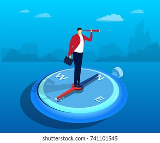 A businessman standing on a compass