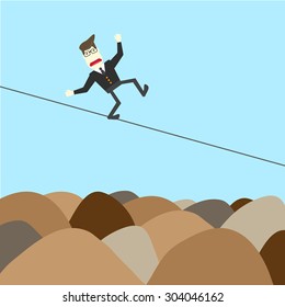 businessman standing on rope in risk 