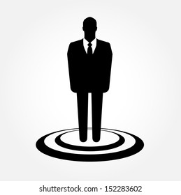 A businessman standing on the target - vector icon
