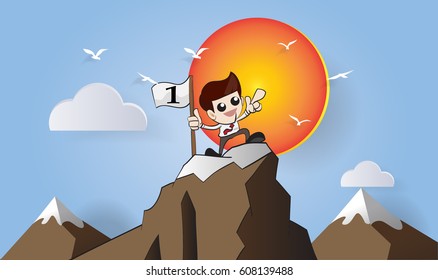 Businessman standing on the top of a high mountain.