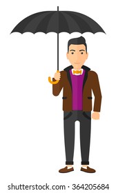 Businessman standing with umbrella.