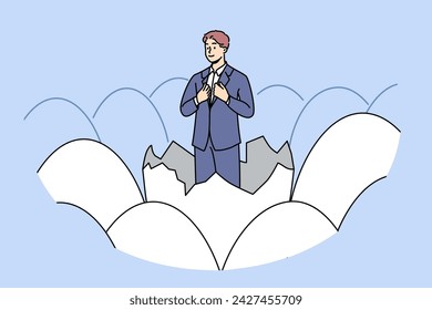 Businessman stands in eggshell as metaphor for emergence of new professional thanks to business education. Ambitious businessman, feels confident in own abilities to obtain managerial position